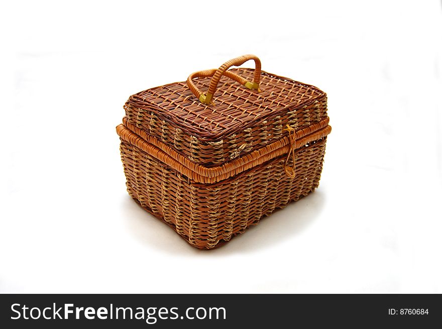 Nice wicker wooden rectangular basket on white background