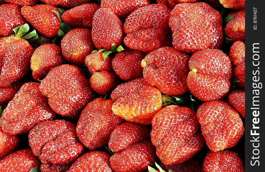 Heap of ripe sweet strawberry. Theme of summer. Heap of ripe sweet strawberry. Theme of summer.