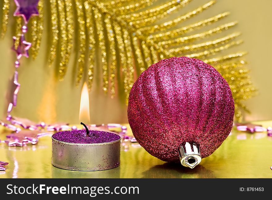 Festive new-year candle and Christmas ball