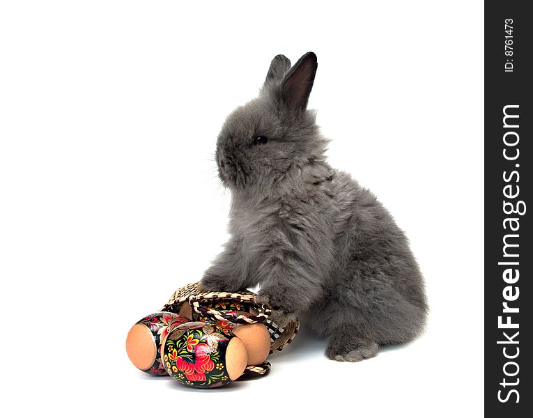 Easter bunny with colored eggs and basket. Easter bunny with colored eggs and basket