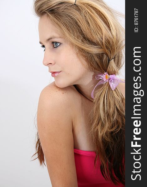 Beautiful female model with blue eyes and hair styled