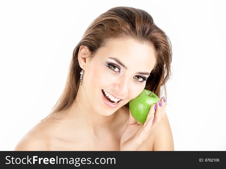 Young smiling woman holding a green apple. Young smiling woman holding a green apple