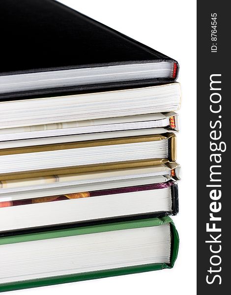 A stack of books on white background