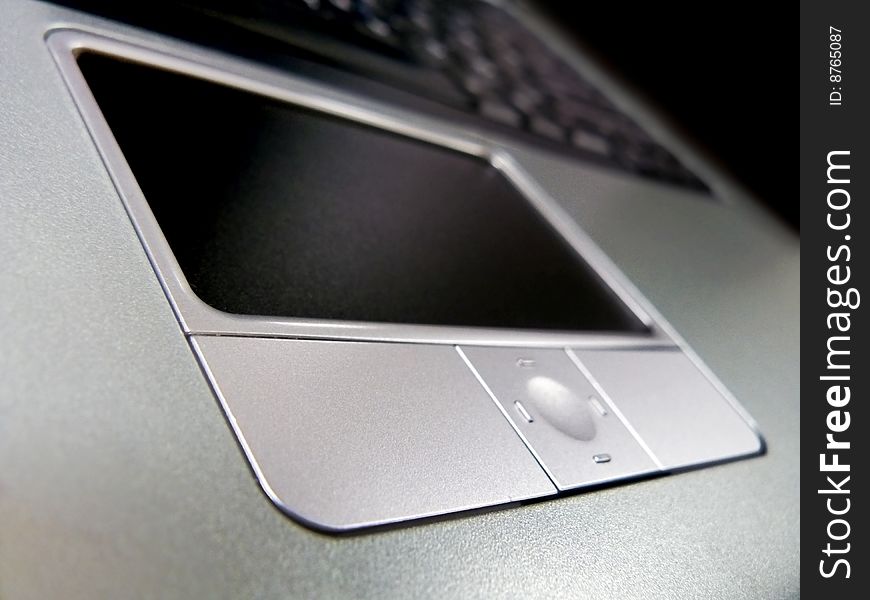 Touchpad on laptop. Element of design.