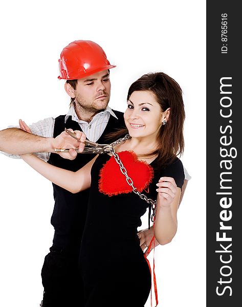 An image of a man in red cap and woman with red heart and chain. An image of a man in red cap and woman with red heart and chain