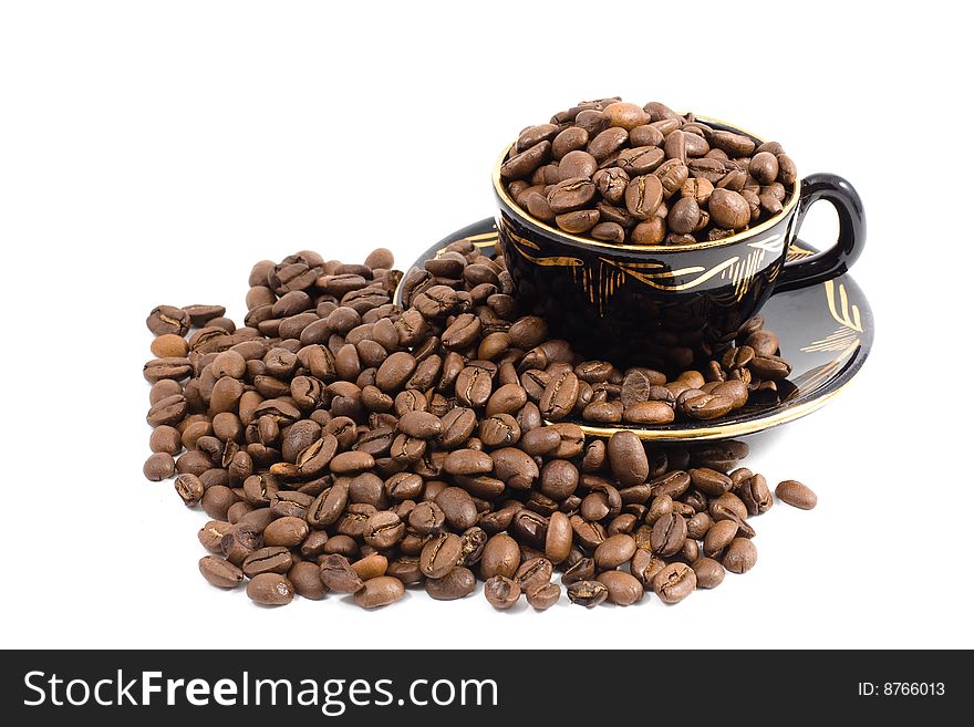 Cup and Coffee beans background. Cup and Coffee beans background