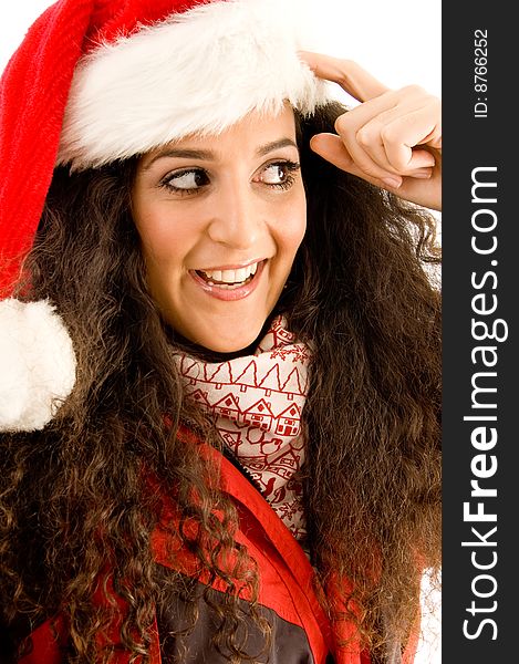 Latin american model wearing christmas hat looking sideways with white background
