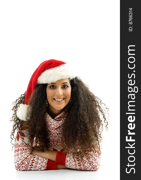 Hispanic female with christmas hat and lying on the floor against white background