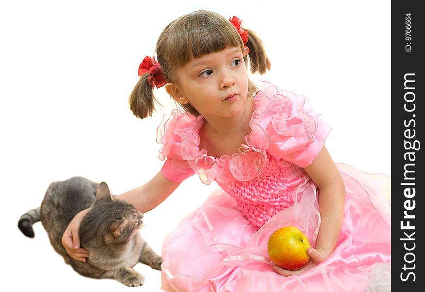 Young girl in pink dress with red apple and gray cat. Young girl in pink dress with red apple and gray cat