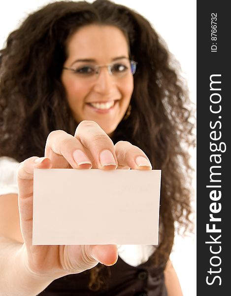 Fashionable businesswoman showing business card on an isolated background