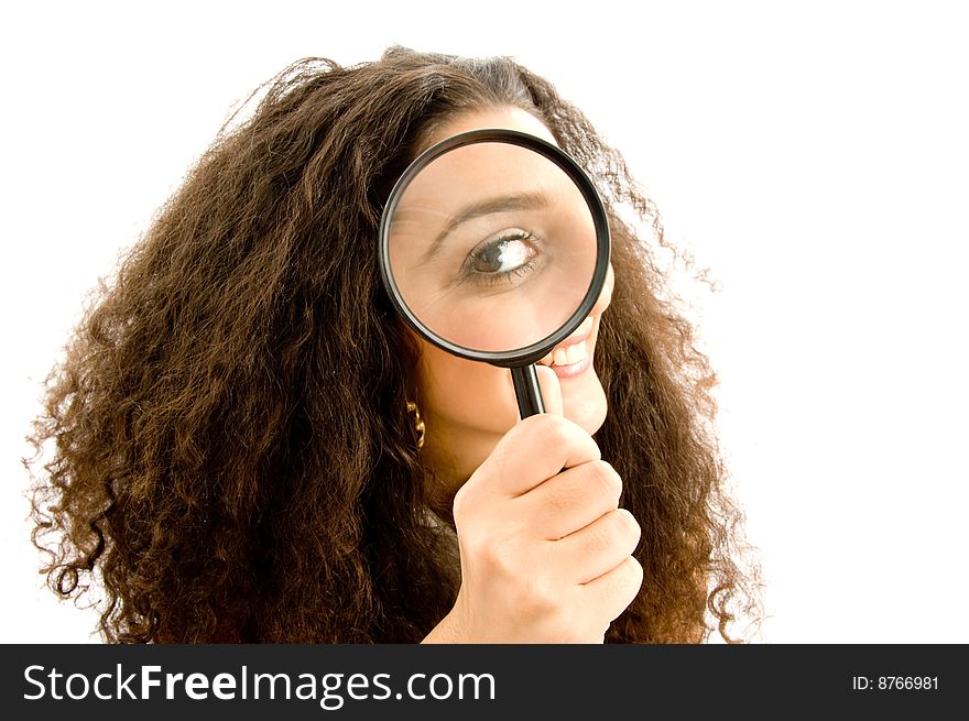 Latin american model holding magnifier on an isolated background
