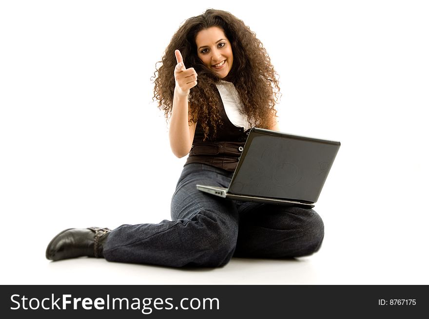 Female busy with laptop and showing thumbs up