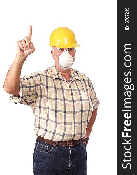 Senior construction worker in a dust mask pointing up. Senior construction worker in a dust mask pointing up