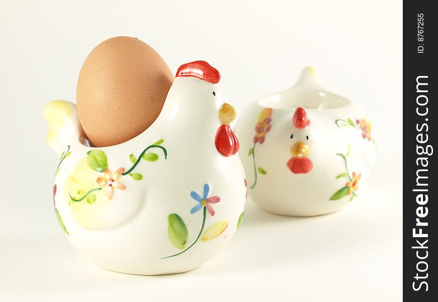 Two painted chickens with boiled egg inside. Two painted chickens with boiled egg inside.