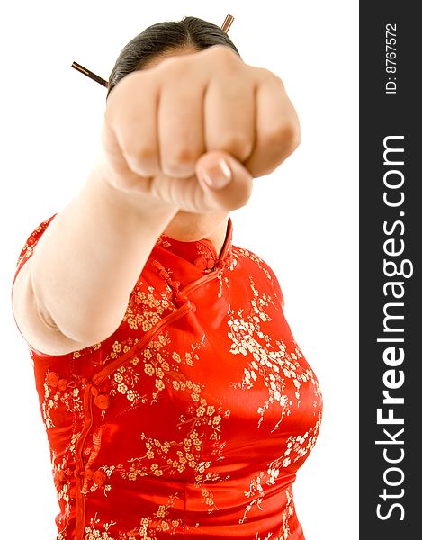 Young woman throwing a punch with white background