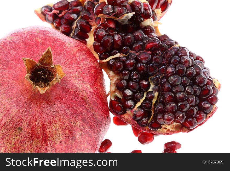 Pomegranate on white.