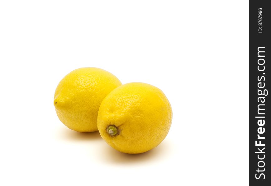 Two lemons isolated on white background with  path. Two lemons isolated on white background with  path