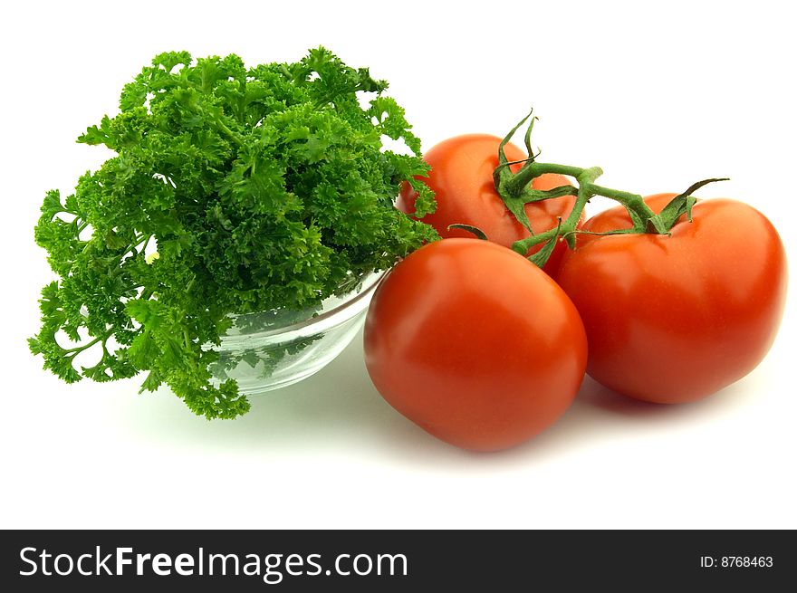 Parsley and tomate on a white background