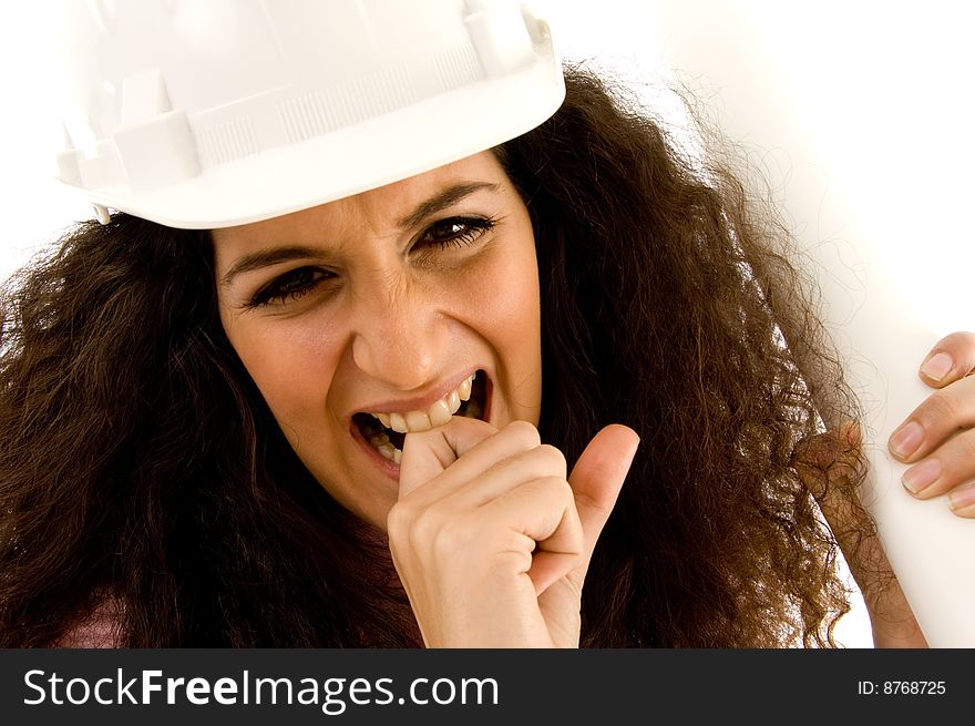 Young frustrated female architect with white background