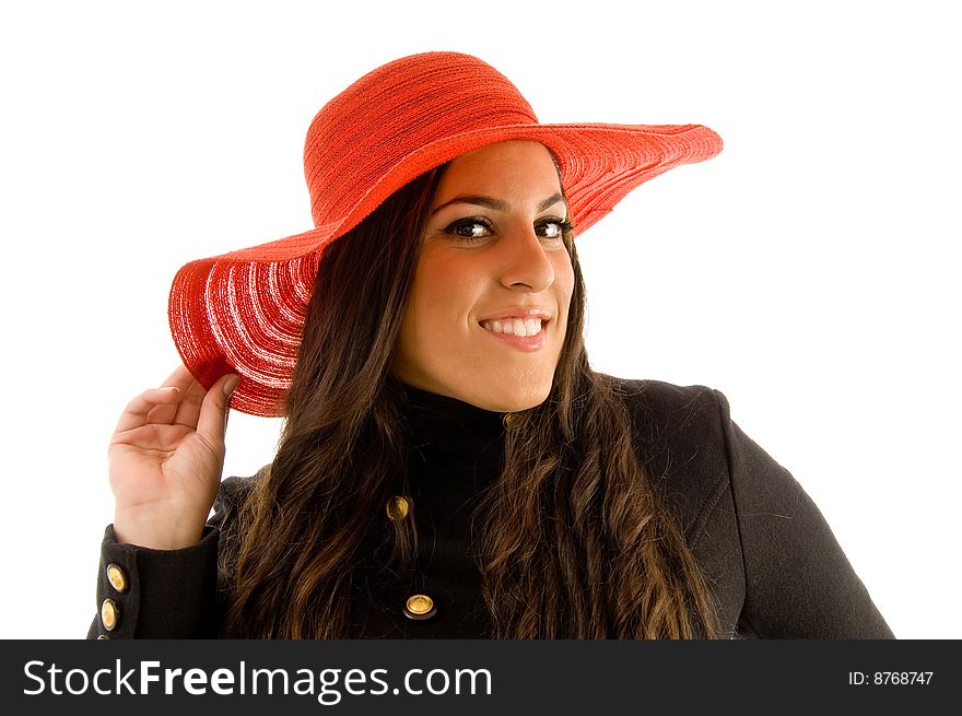 Beautiful model wearing hat against white background