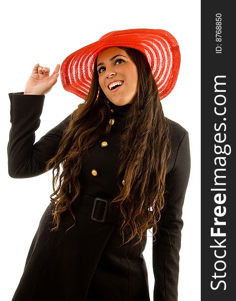 Pretty young model wearing hat on an isolated white background