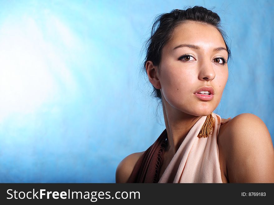 Portrait of beautiful woman in silk dress