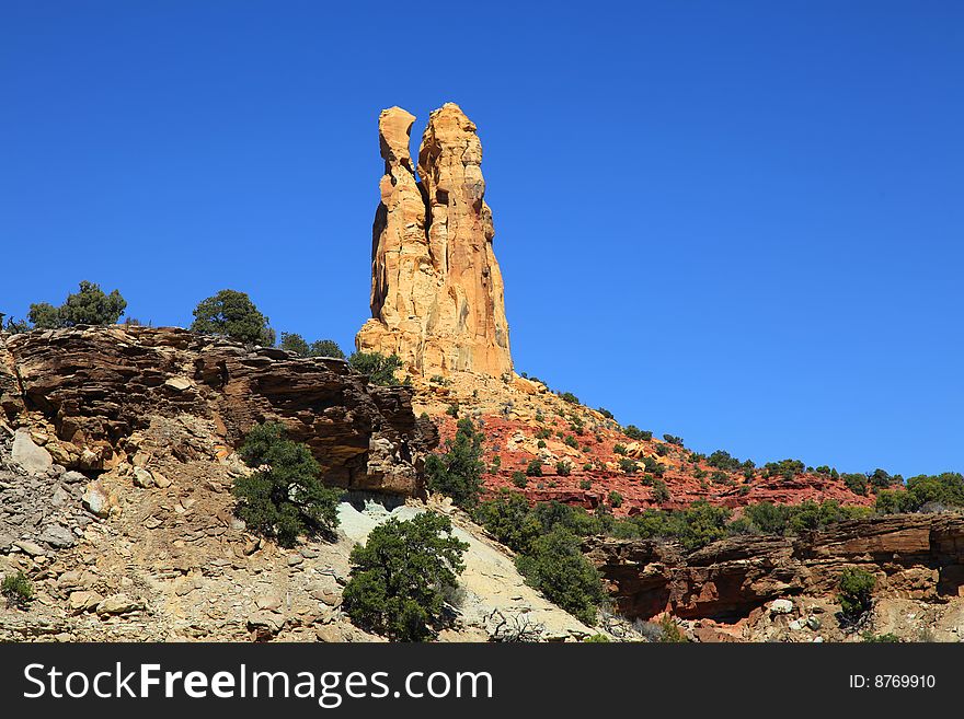 View of red rock formations in San Rafael Swell with blue skyï¿½s