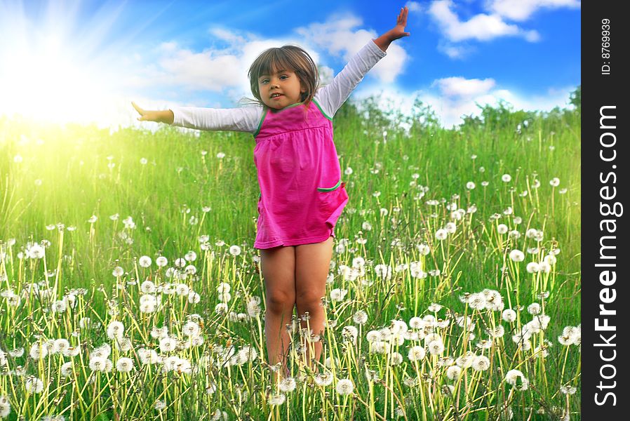 Little girl Jumping on the meadow. Little girl Jumping on the meadow