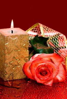 Golden Candle With Rose Stock Photography