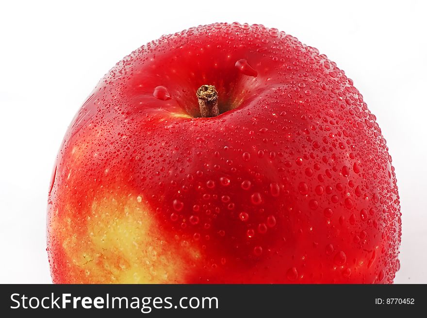 Red fresh apple close up on a white background