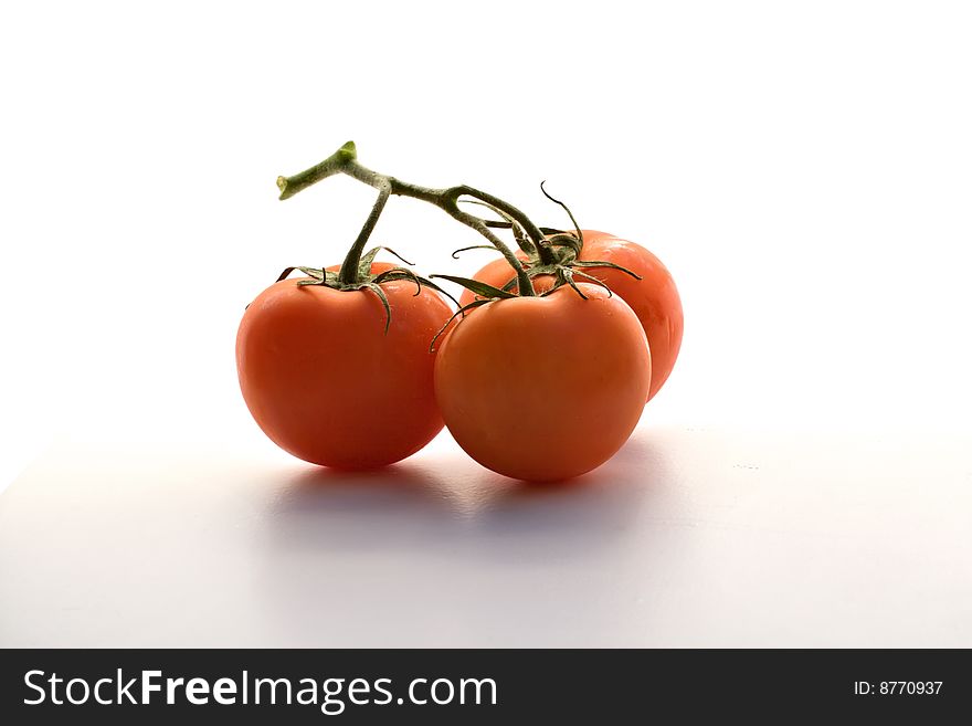 Vine Ripe Tomatoes on White Background