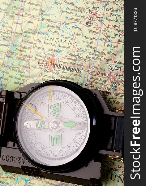 Steel compass on travel map of Indianapolis. Steel compass on travel map of Indianapolis
