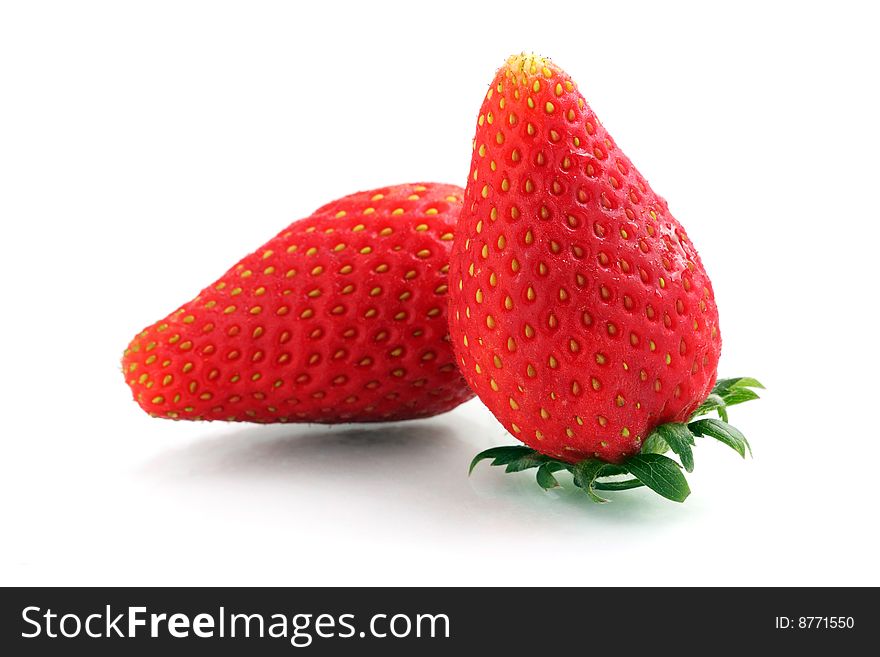 Close up of two Korea strawberry over white background.