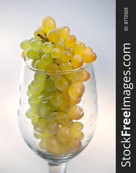 Grapes in wine glass