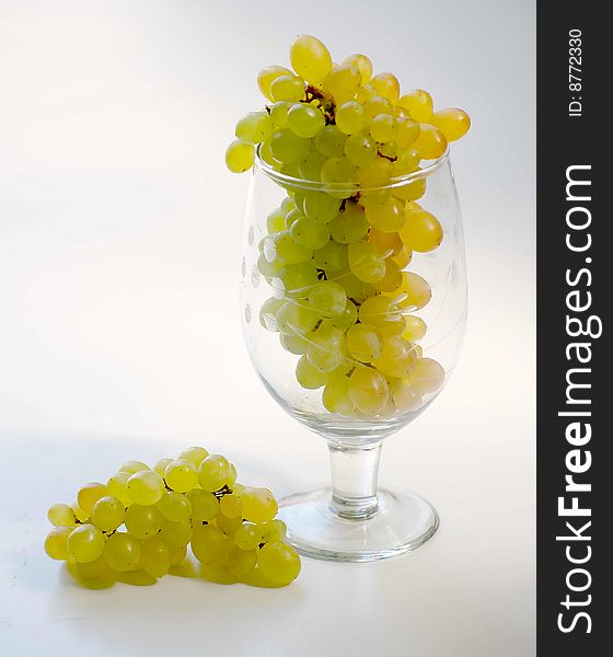 Grapes with wine glass