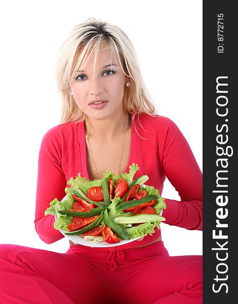 Girl with salad isolated on white