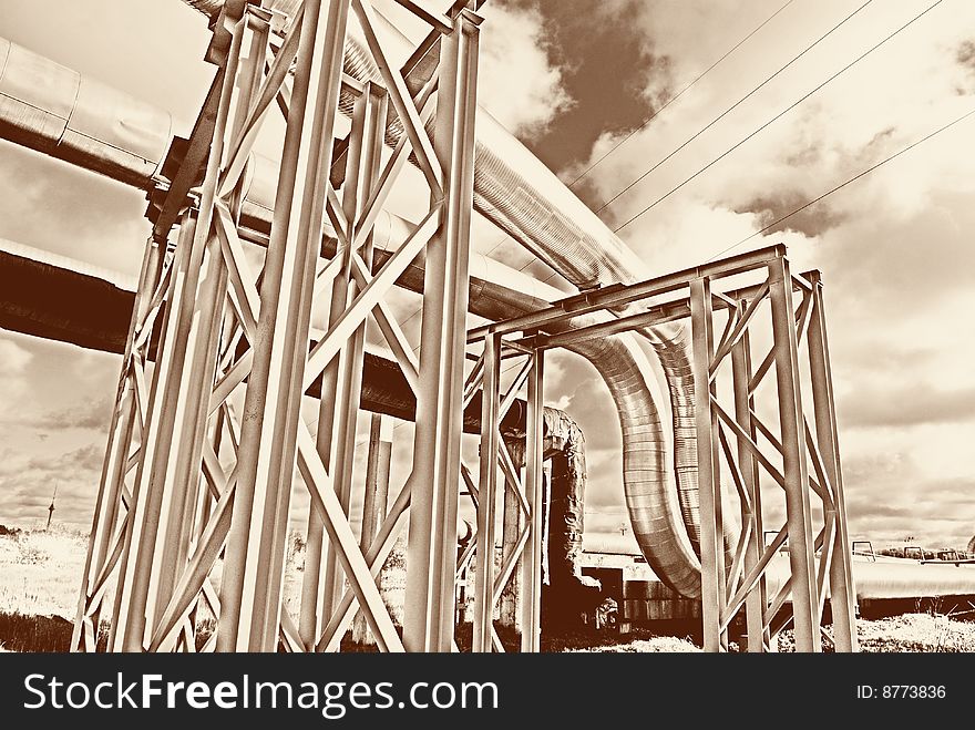 Steel Pipe-line Is Photographed On Sky Background