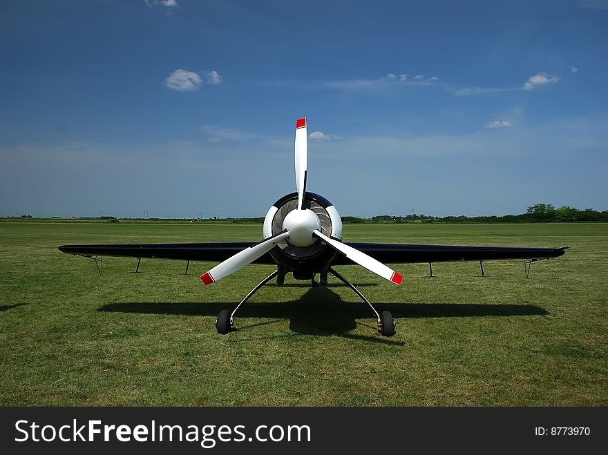 Airplane in the green field