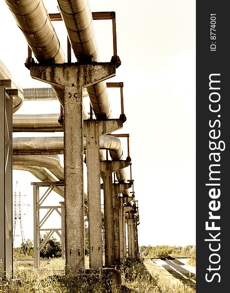 Metallic pipeline over blue sky. Metallic pipeline over blue sky