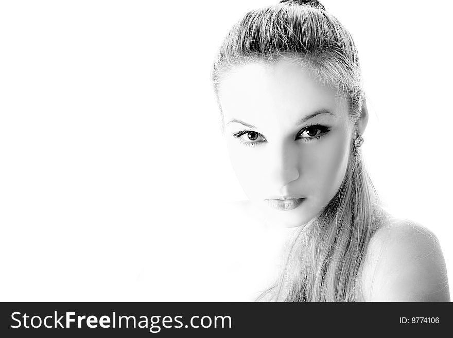 Half face of girl isolated on white (hi key studio shot)