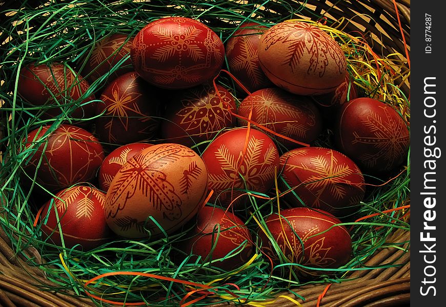Red easter eggs in the basket