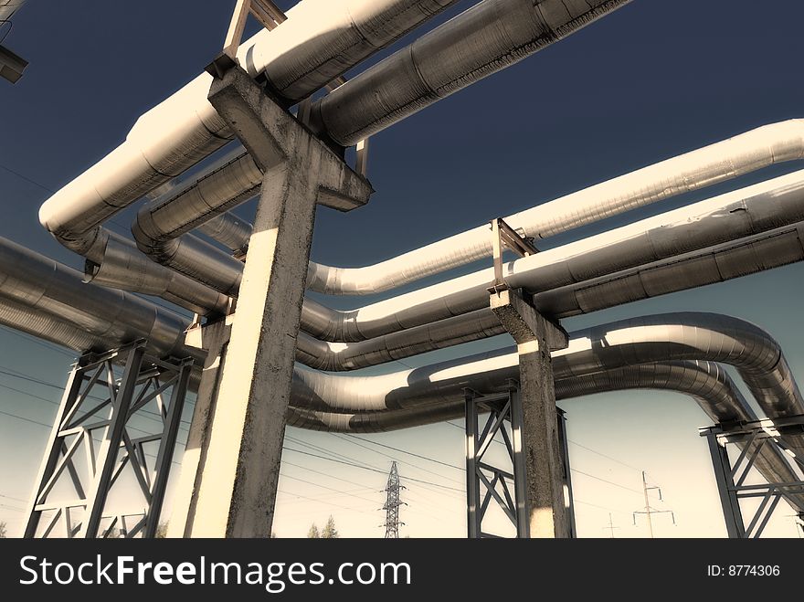 Industrial Pipelines Against Blue Sky