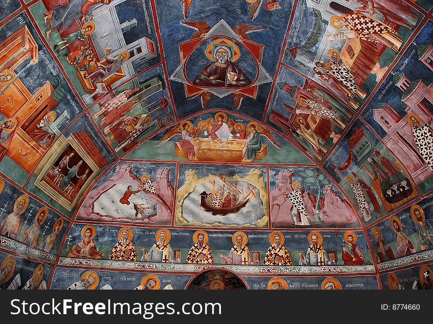 Frescoes on the walls and roof in christian orthodox monastery