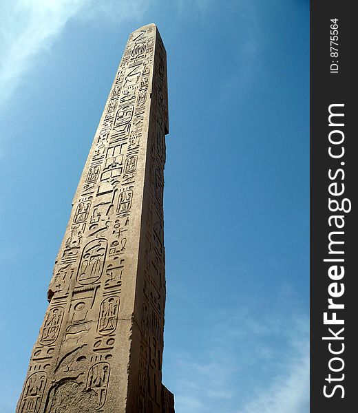 A sandstone obelisk in egyptian temple.