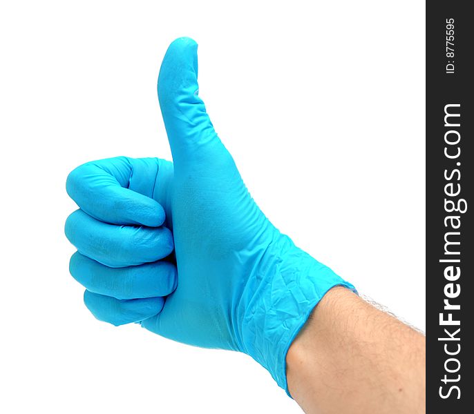 Man's hand in a blue latex glove. Man's hand in a blue latex glove