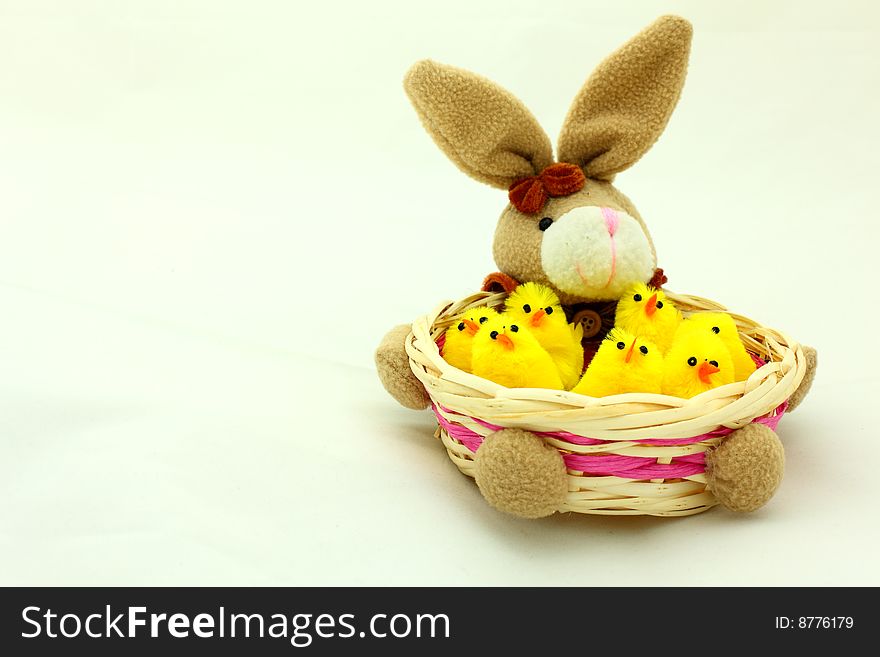 Close-up of easter bunny basket with yellow chicken