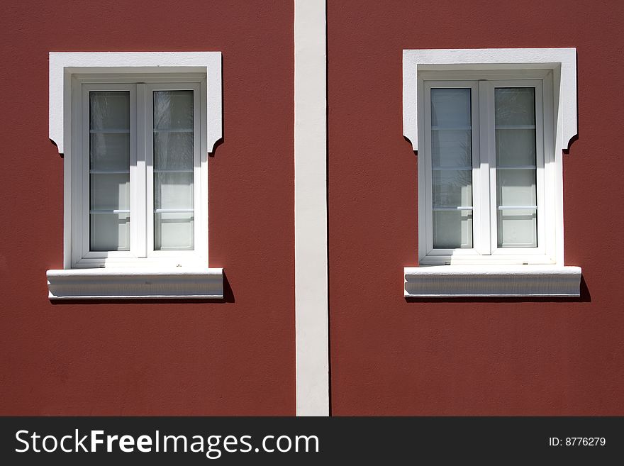 Portuguese windows and  red wall