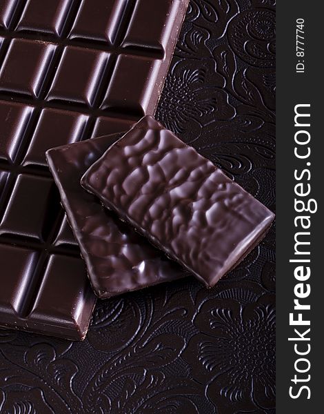 Rich dark chocolate bar, studio shot