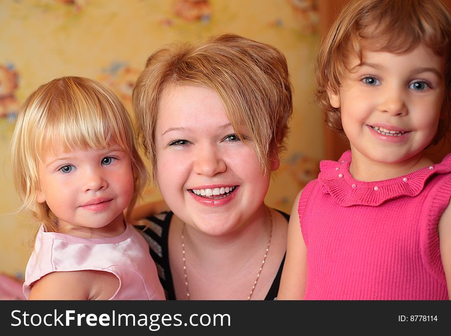 Smiling girl with two children