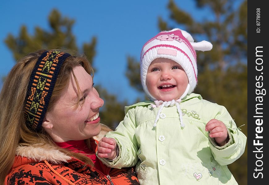 Fun child with mother at springtime